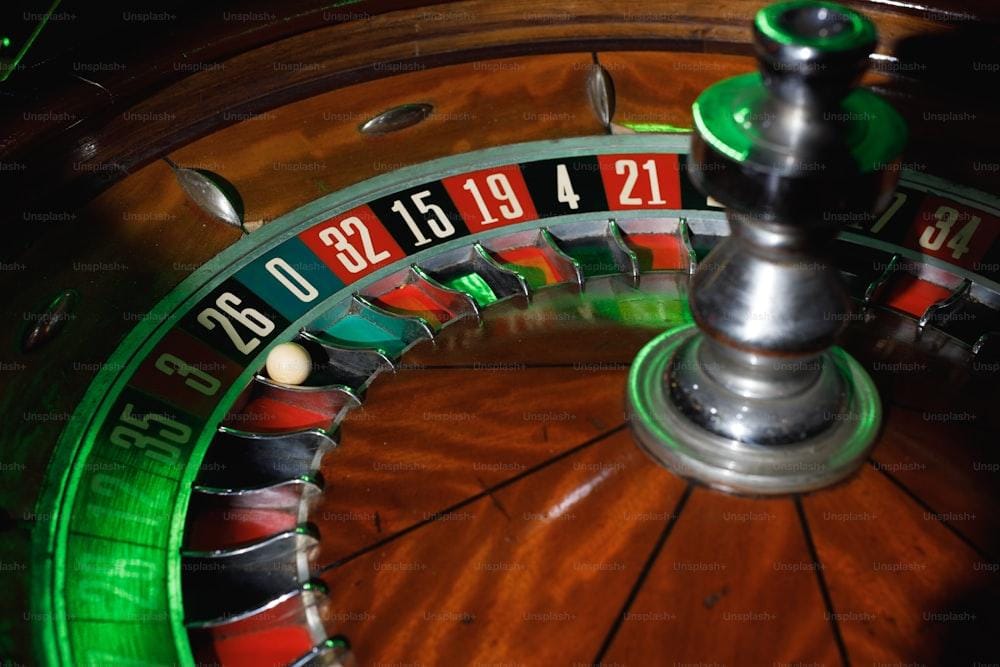 The Ultimate Guide to Understanding Online Roulette: Tips, Tricks, and Tactics 1 a close up of a casino rouleet