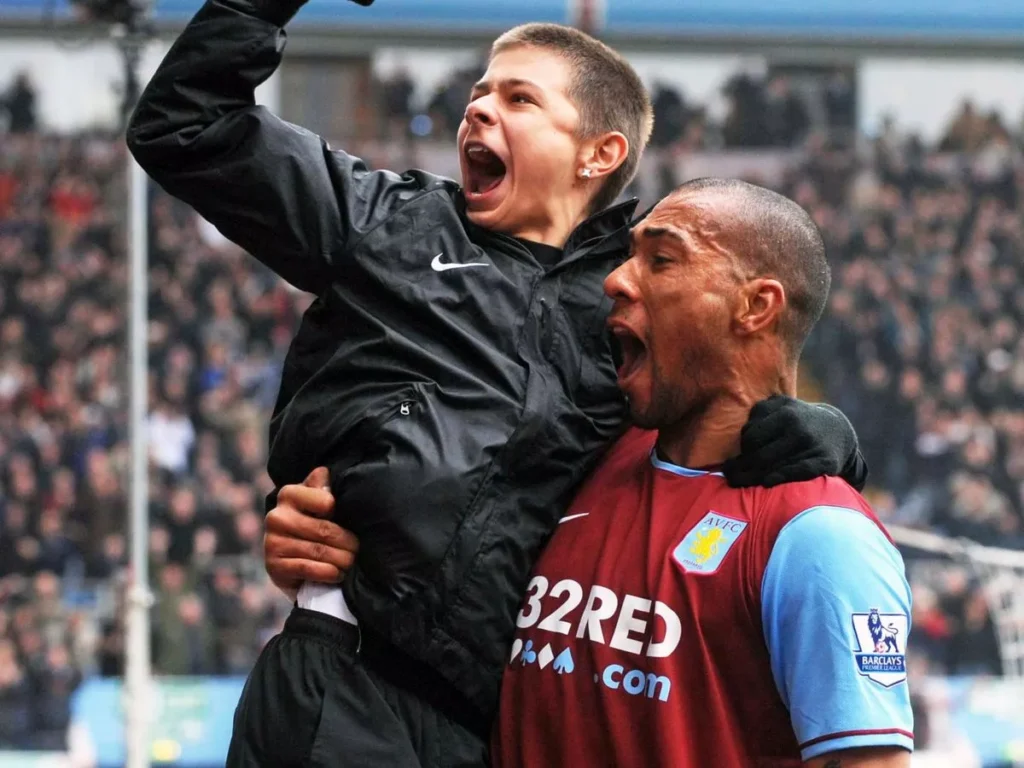 John Carew Celebrates With A Ball Boy After Scoring In Aston Villas 5 1 Win Over Birmingham City