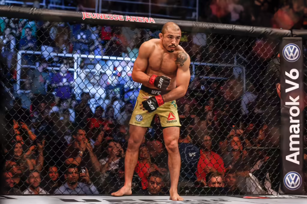 10 Best UFC Fighters of All Time by Weight Class: A Comprehensive Breakdown 9 Jose Aldo of Brazil prepares to fight Alexander Volkanovski scaled 1