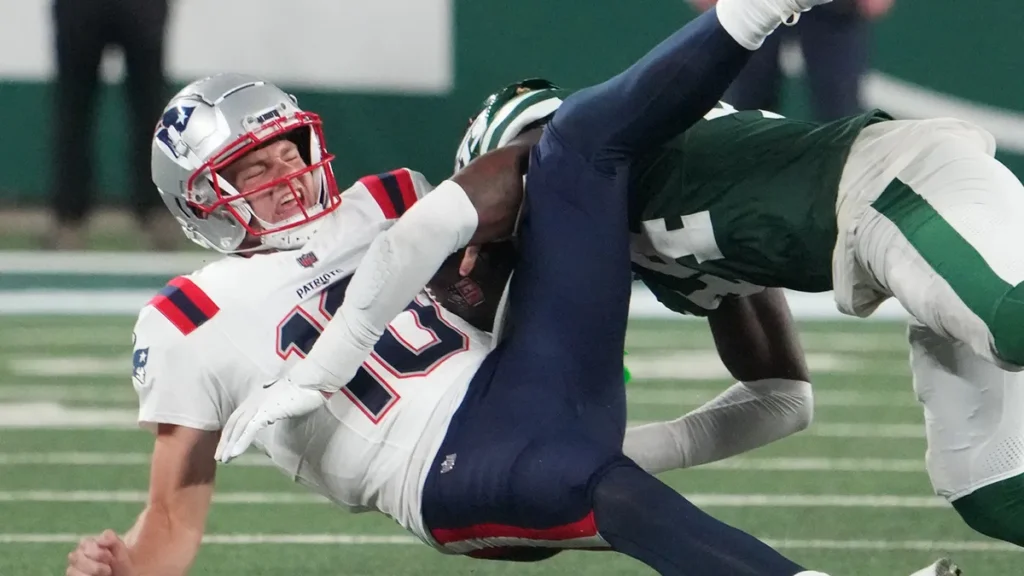 Patriots quarterback Drake Maye gets sacked