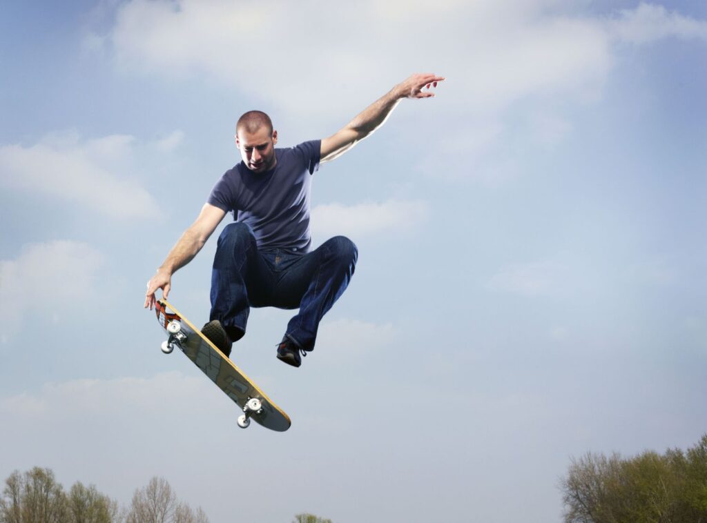 man on skateboard in mid air 114997351 5a29a61822fa3a0037fac8a4