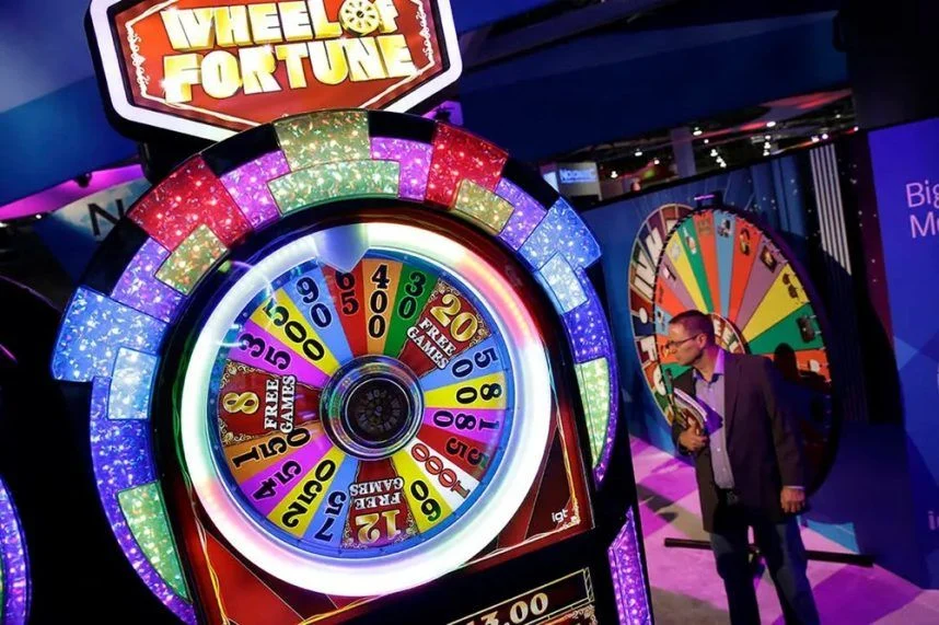 What Is Slot Volatility? Low vs High Variance Slots Explained 1 wheel 858x571 1